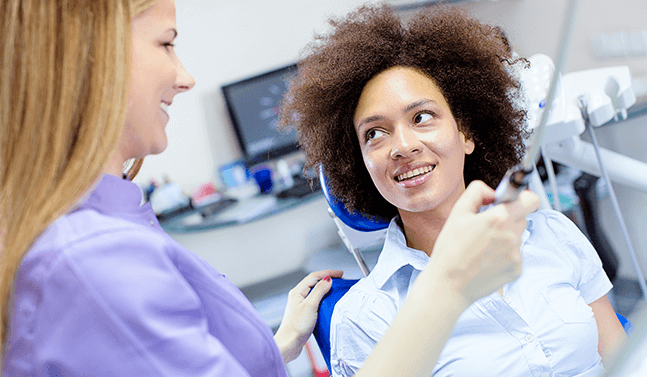 woman having her teeth cleaned