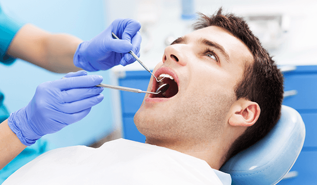 man at the dentist