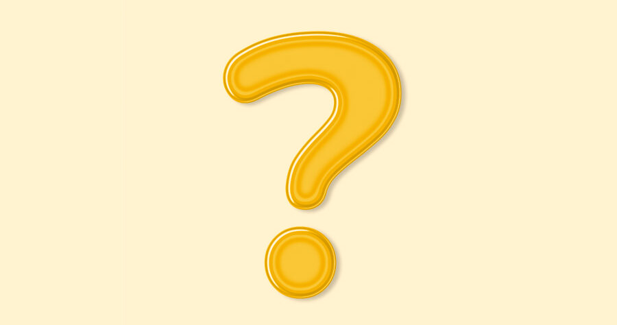 A yellow question mark on a yellow background for a post about what causes yellow teeth