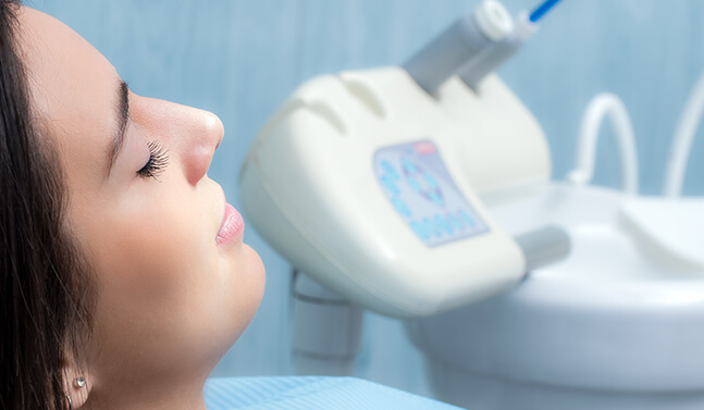 woman undergoing sedation before her root canal