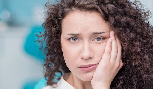 woman with jaw pain