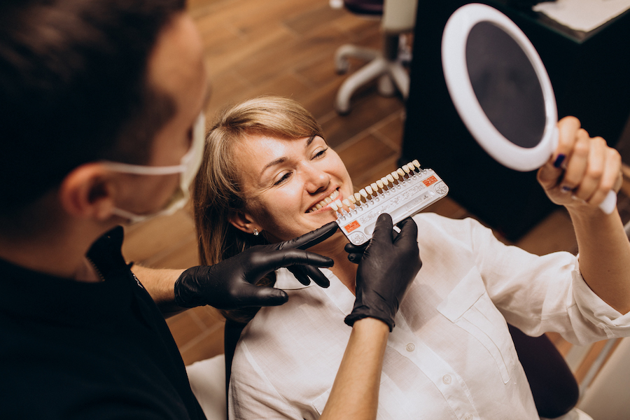 cosmetic dental treatments, woman in dental chair