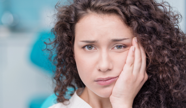 woman with mouth pain