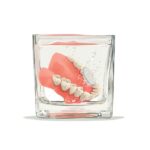 denture cleaning, denture soaking in denture cleaning solution